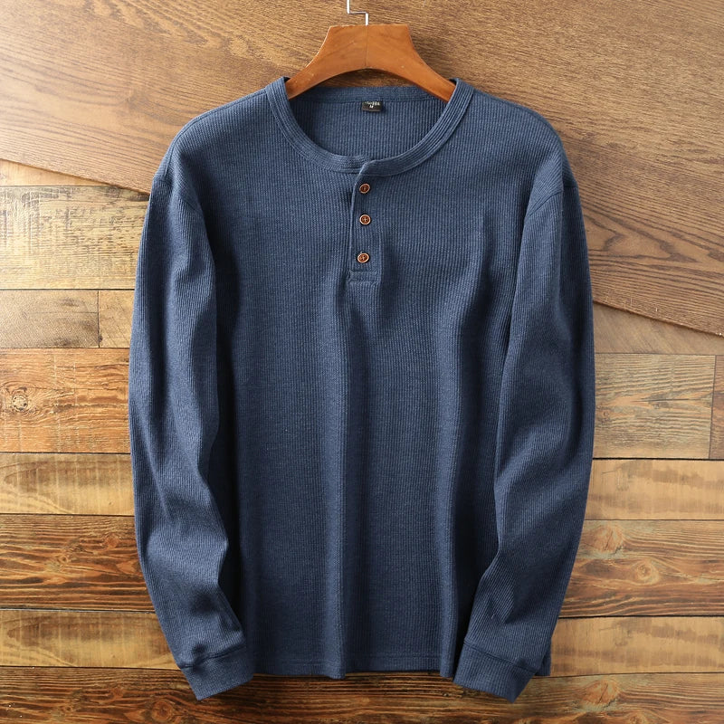 Versatile men's long sleeve waffle knit top. Perfect for layering & classic everyday style.