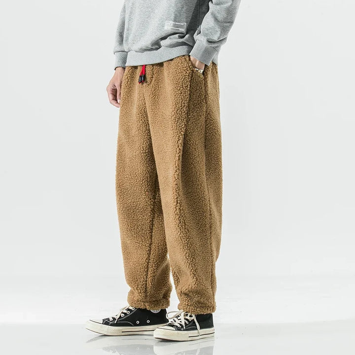 Versatile men's cozy sherpa joggers in dark grey, perfect casual bottoms or comfortable sweatpants for everyday wear.