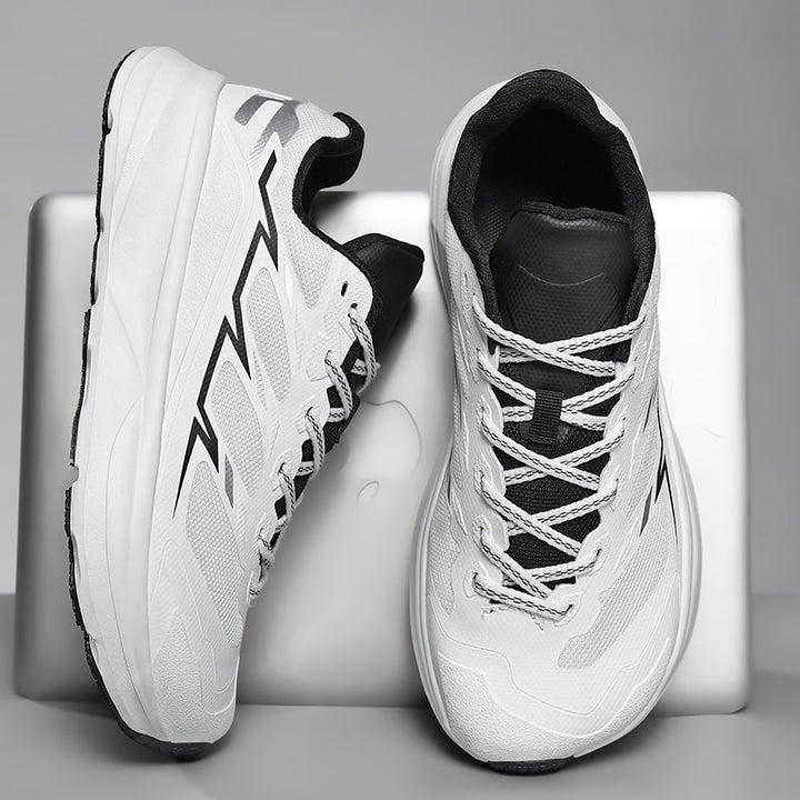 Men's Trailmark breathable mesh running shoes, offering flexible support & durable performance.