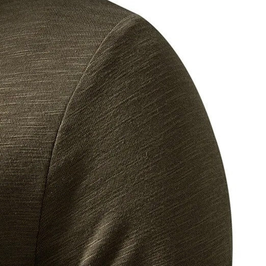 Detail of men's henley shirt collar & button placket. Slim fit, long sleeve for modern casual wear.