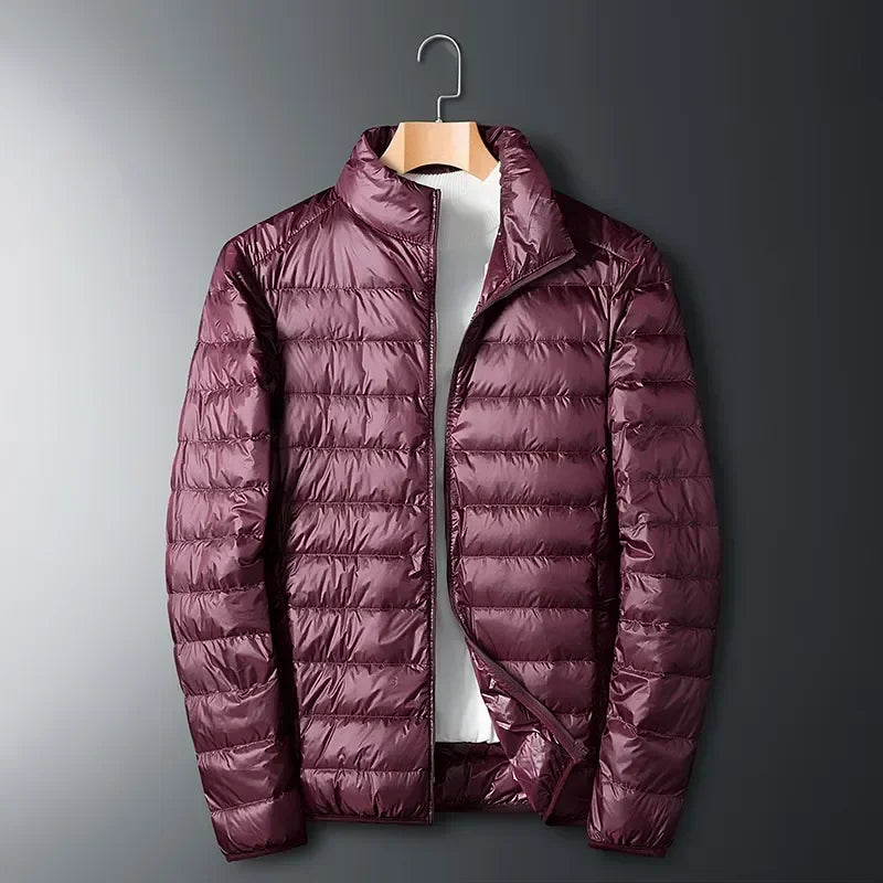 Stylish unisex lightweight puffer jacket. Comfortable & warm, packable for outdoor activities & travel in cold weather.