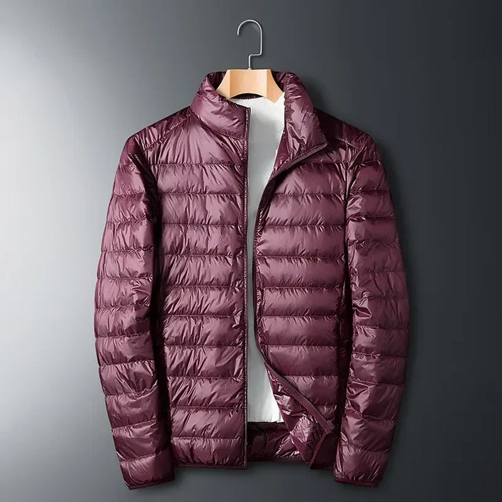 Stylish unisex lightweight puffer jacket. Comfortable & warm, packable for outdoor activities & travel in cold weather.