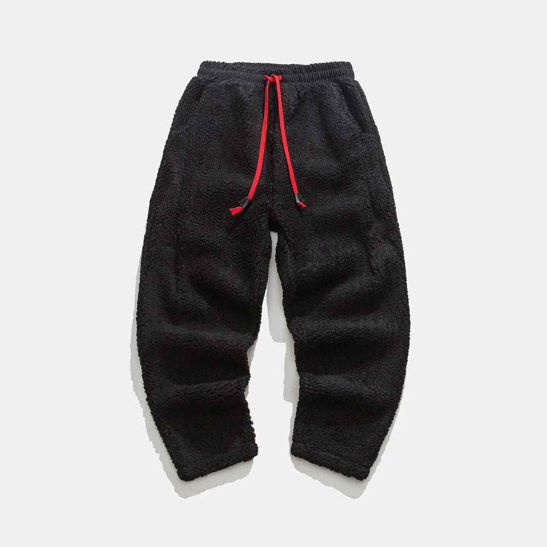 Stylish men's sherpa joggers, a blend of streetwear fashion & ultimate loungewear comfort. Cozy and trendy.
