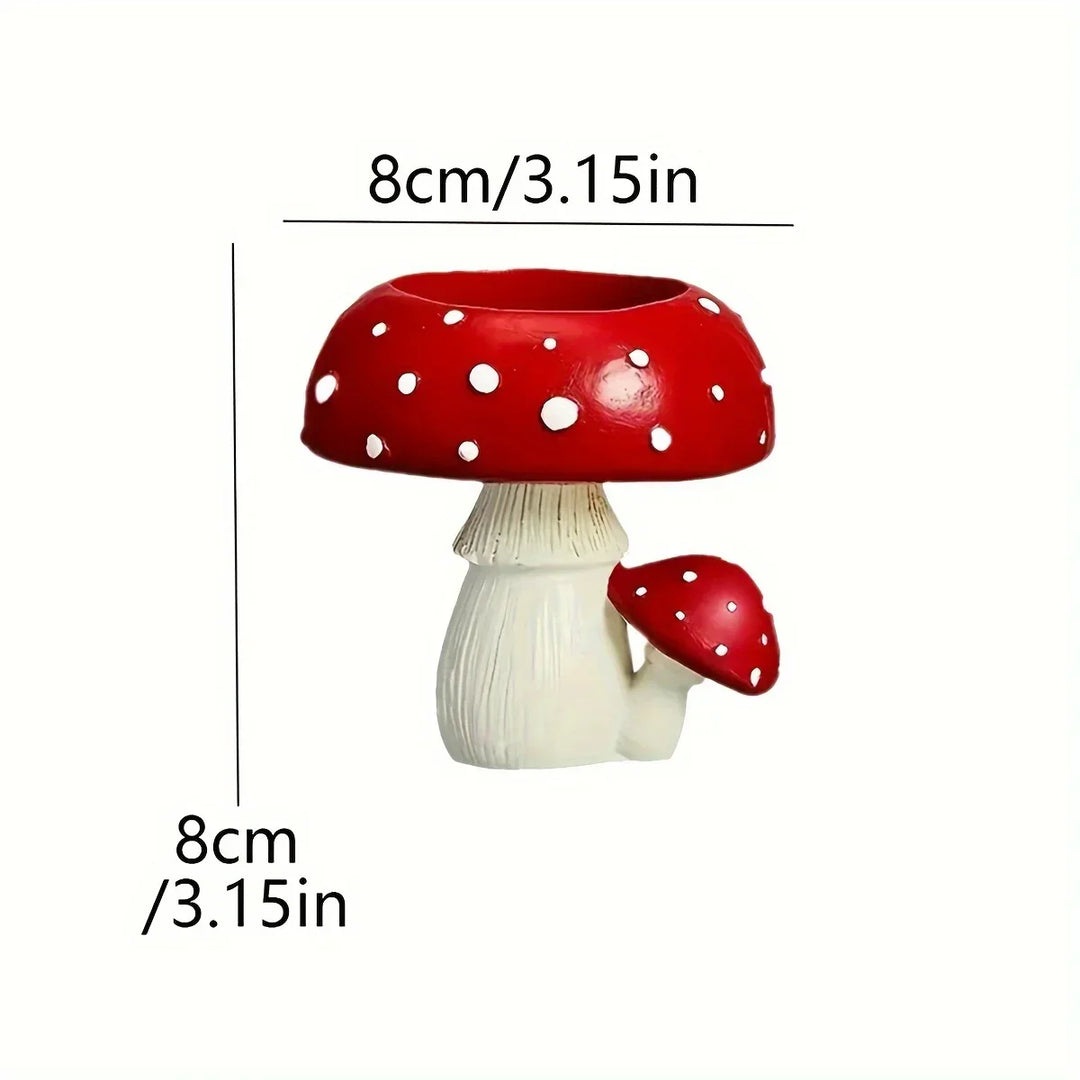 Charming whimsical mushroom candle stand, made of resin. Perfect decorative piece for cozy home decor.