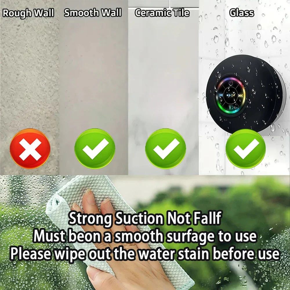 Wireless audio speaker, black & portable, with bright LED, suction mount for shower, outdoor, and travel.