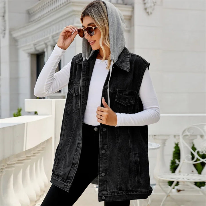 Fashionable women's denim hooded vest. A versatile sleeveless jacket for casual wear, layering & street style.