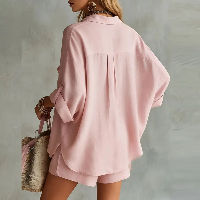 Comfortable women's linen blend two-piece shorts set with elastic waist, ideal for relaxed summer days.