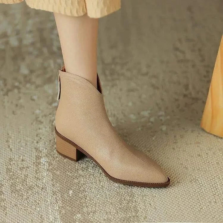 Comfortable women's everyday ankle boots, featuring a stylish pointed toe and easy slip-on fit.