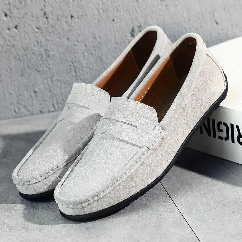 Essential men's footwear: classic slip-on loafers offering style, comfort, and versatility for any man.