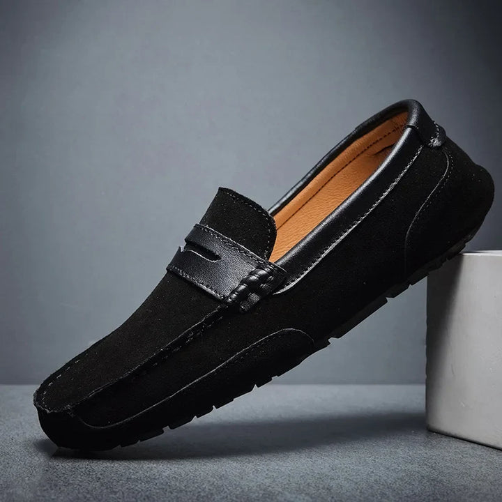 Comfortable black men's slip-on loafers. Stylish dress shoes for men, perfect for formal & casual outfits.