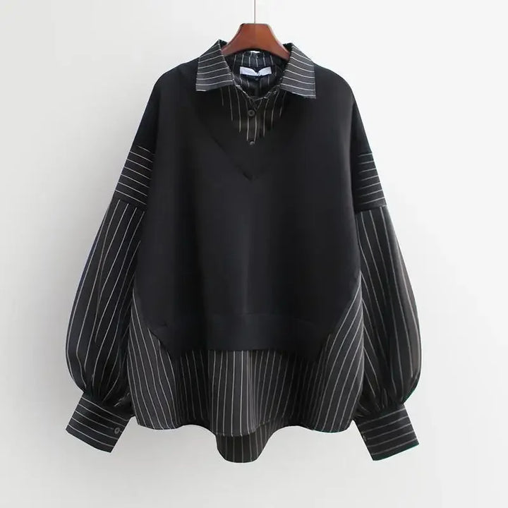 Chic gray women's layered blouse with a modern design, offering comfort and elegant style for any occasion.