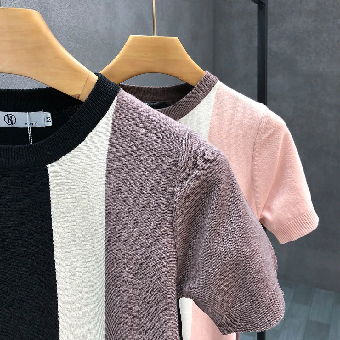 Stylish men's black & pink color block crewneck sweater. A comfortable long sleeve top for modern fall & winter fashion.
