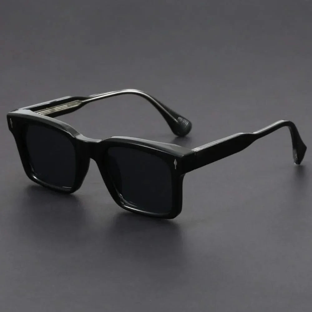 Trendy bold black square polarized sunglasses for all genders, offering sun glare reduction.