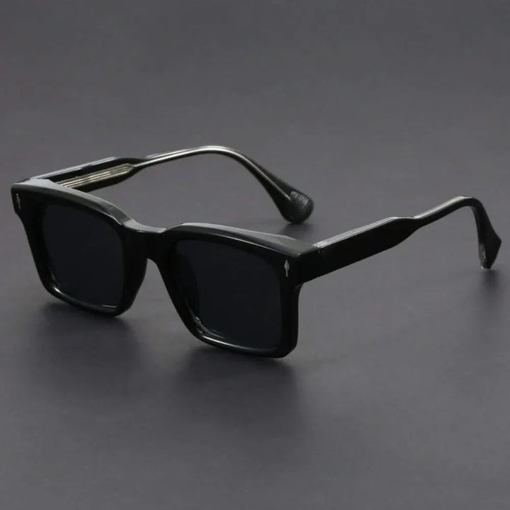 Trendy bold black square polarized sunglasses for all genders, offering sun glare reduction.