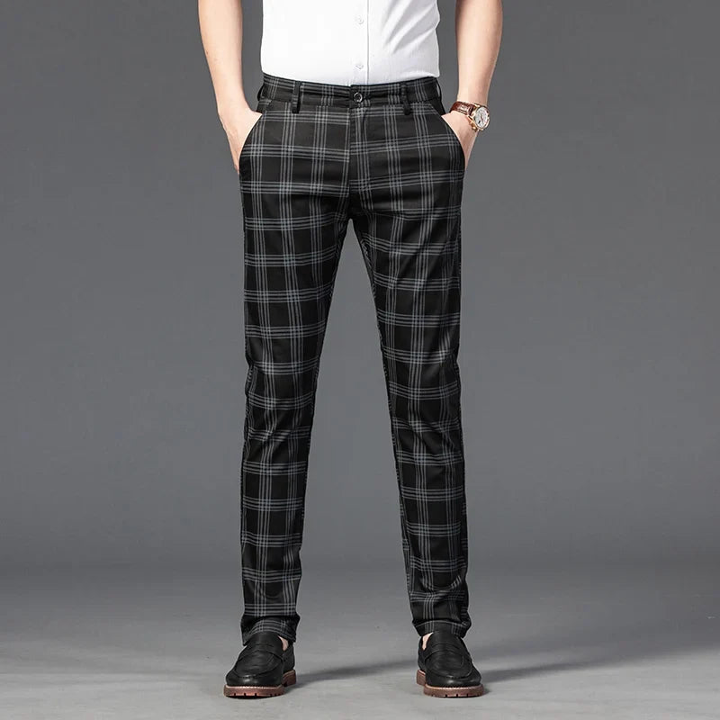 Durable men's slim fit plaid trousers with stretch fabric, offering comfort for all-day formal wear.