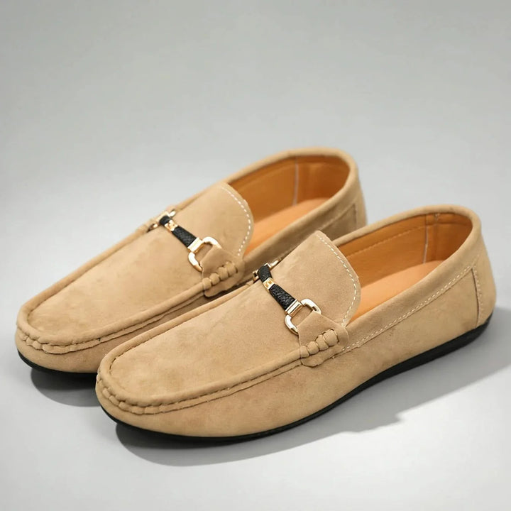 Men's classic slip-on loafers with elegant buckle detail, perfect for smart casual or office wear.