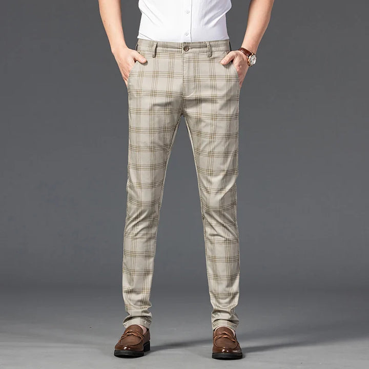 Fashionable men's plaid slim fit dress pants, essential for a sharp, modern men's formal wear ensemble.