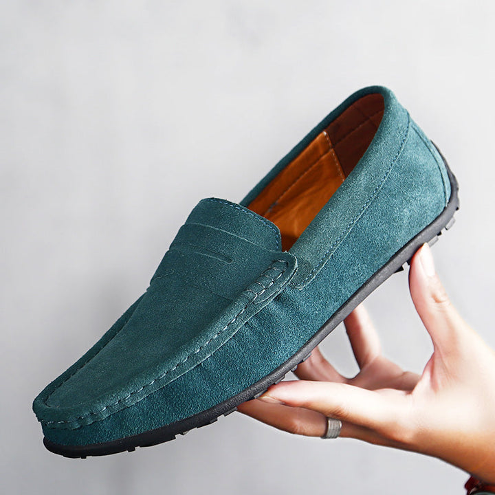 Men's slip-on dress shoes, elegant & comfortable for business casual or formal attire. Classic style.