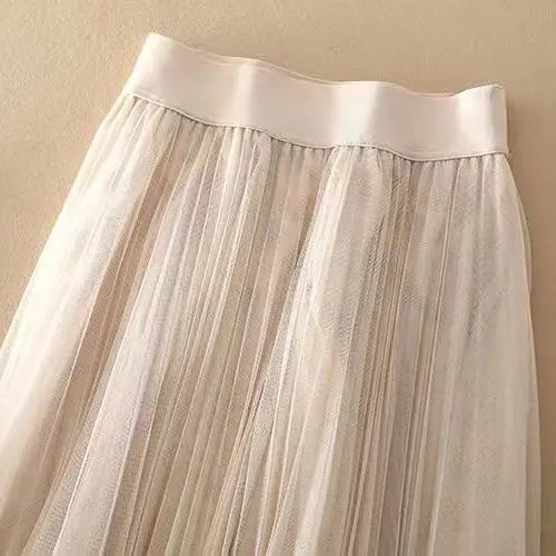 Lightweight women's flowy A-line pleated midi skirt, high waist, comfortable and elegant for summer versatility.