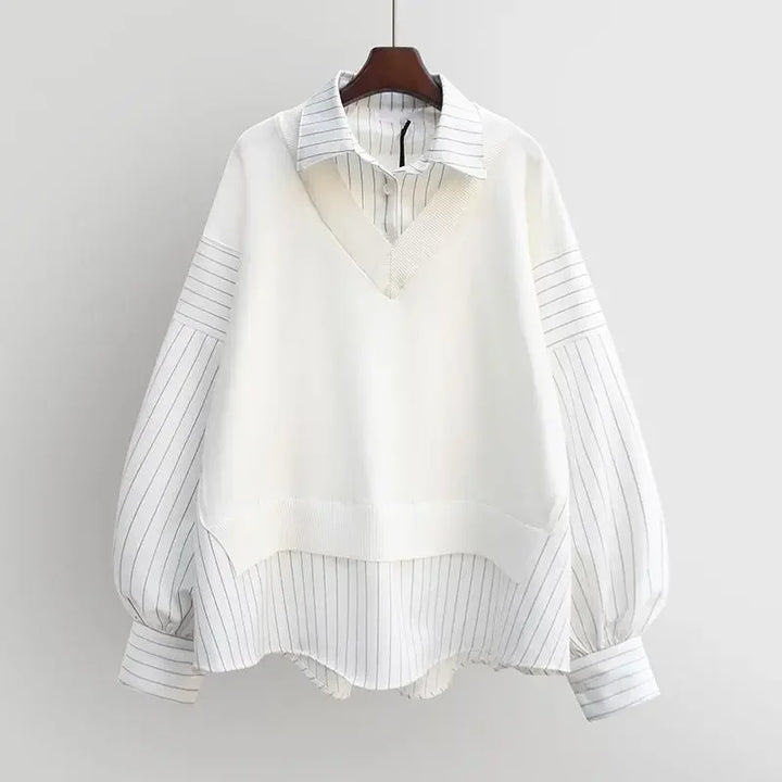 Sophisticated black layered blouse for women, featuring a comfortable and chic long-sleeve modern design.
