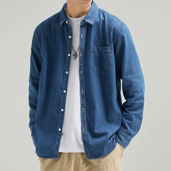 Stylish men's black denim button-down shirt, long-sleeve, classic casual wear for modern style.