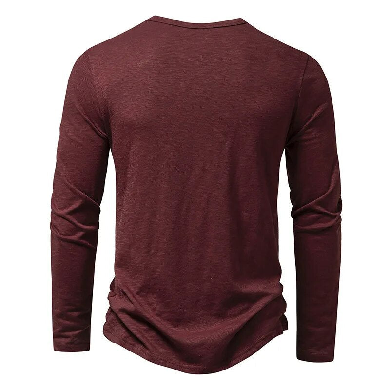 Men's wardrobe essential slim fit henley shirt. Classic long sleeve for versatile everyday style.