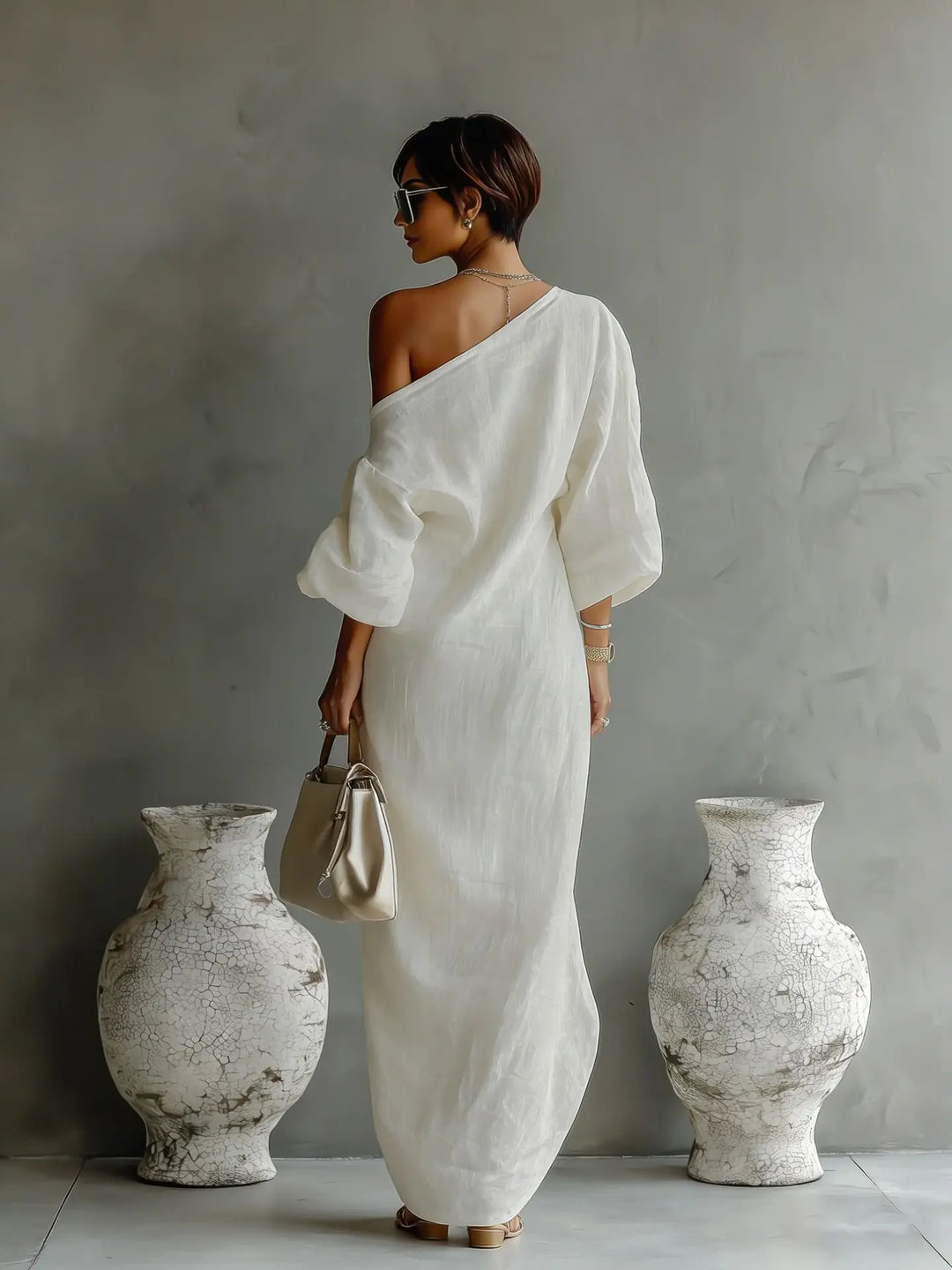 Blue women's one shoulder asymmetrical summer dress. Relaxed fit batwing sleeve offers comfort and elegant style.