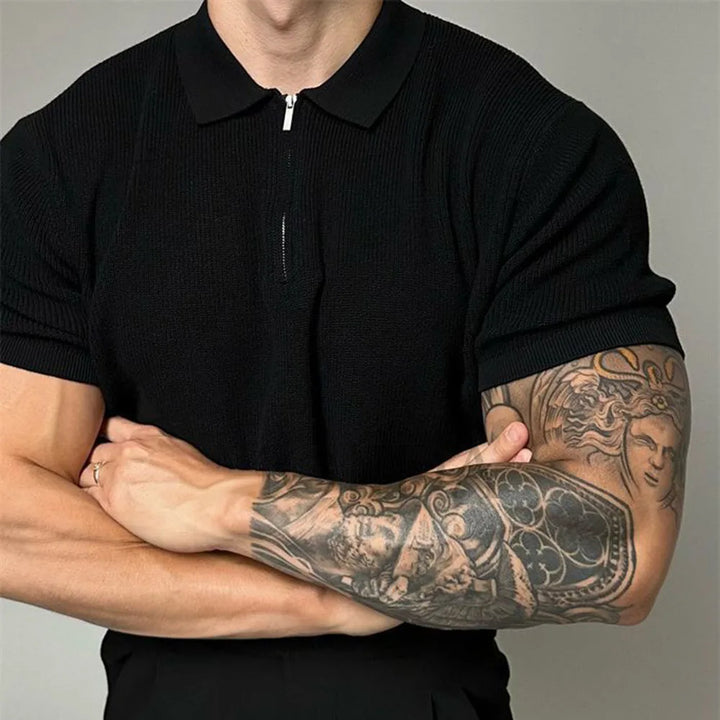 Man modeling a modern tailored fit Men's Contour Zip-Up Polo Shirt, ideal for a comfortable casual look.