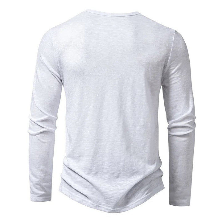 Close-up of comfortable fabric texture on men's slim fit henley shirt. Everyday long sleeve.