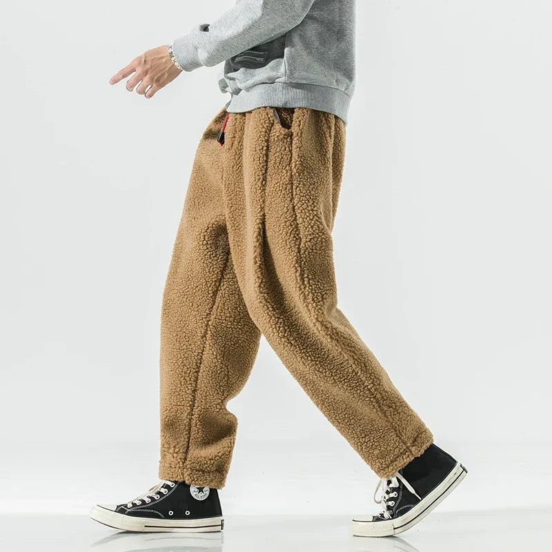 Men's cozy sherpa joggers, relaxed fit, perfect for ultimate comfort and warmth. Ideal loungewear & casual bottoms.