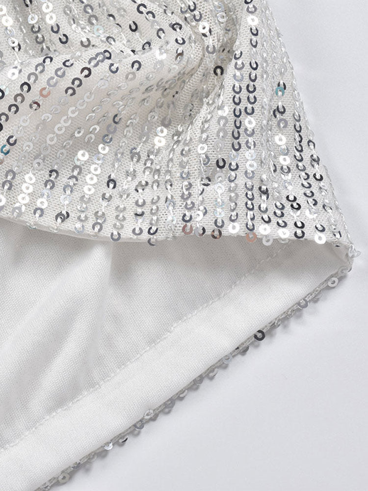 Sparkly women's sequin shorts. Shimmering silver bottoms, ideal for party, festival, or night out.