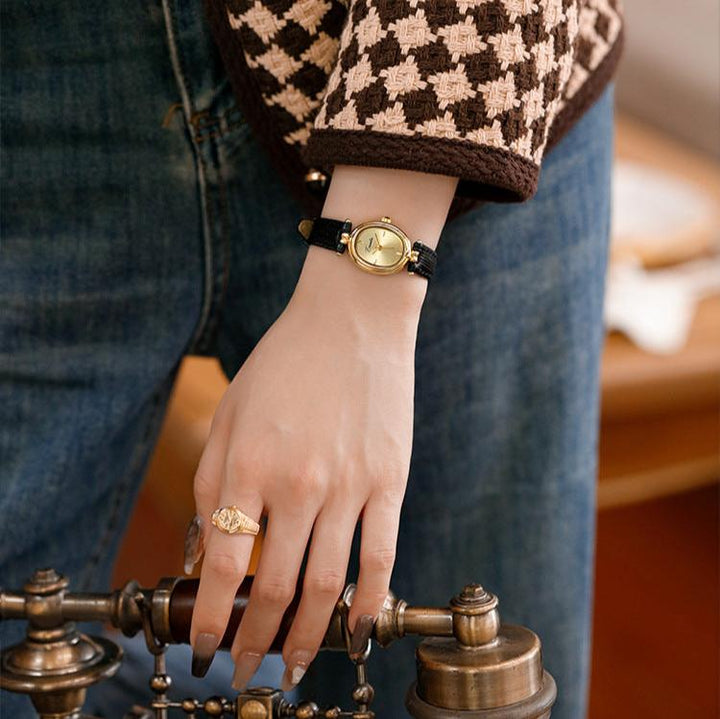 Elegant slim women's wristwatch with fine detailing, a sophisticated accessory. Oval or rectangle options.