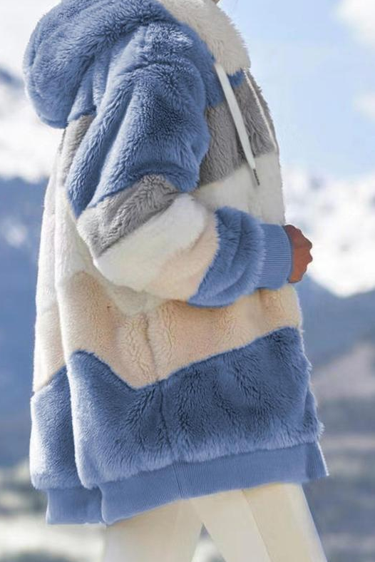 Statement women's oversized striped faux fur teddy coat. Hooded, cozy, & chic fall/winter style.
