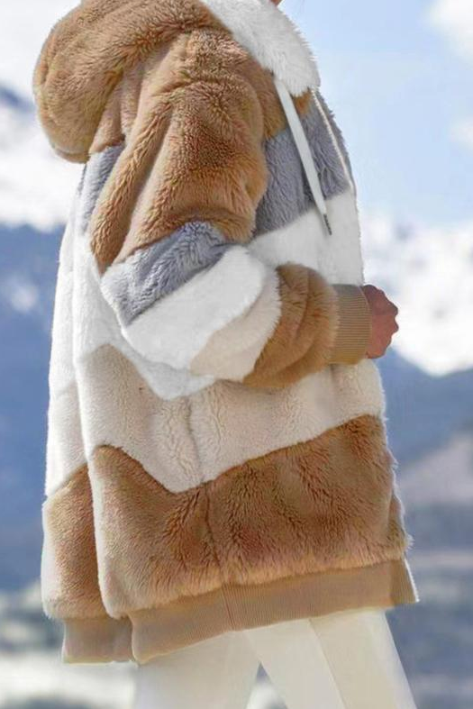 Oversized striped faux fur teddy jacket for women. Hooded design, cozy and warm winter fashion.