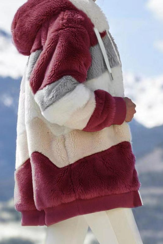 Warm women's oversized striped hooded faux fur teddy jacket. Cozy fall attire, chic winter outerwear.