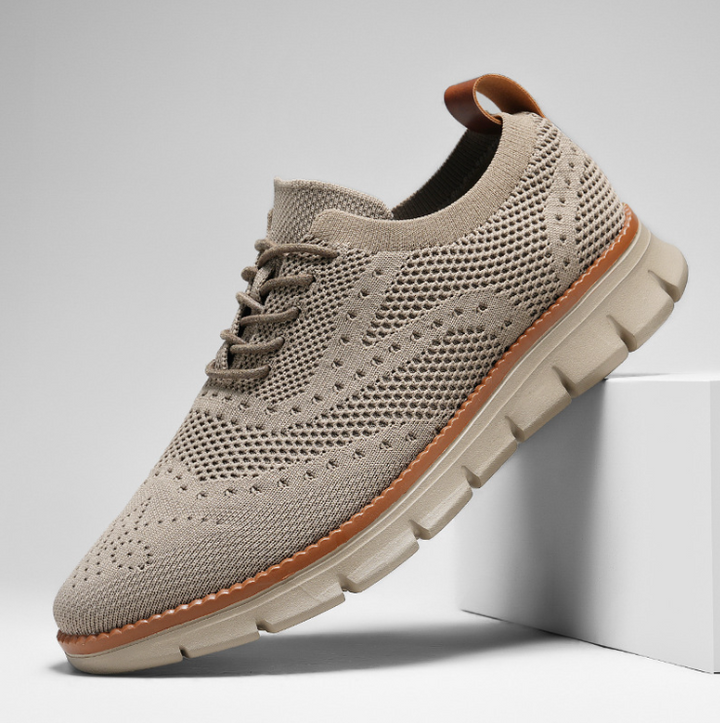 Beige men's fashion sneakers, Heritage Dress style, a comfortable footwear choice.