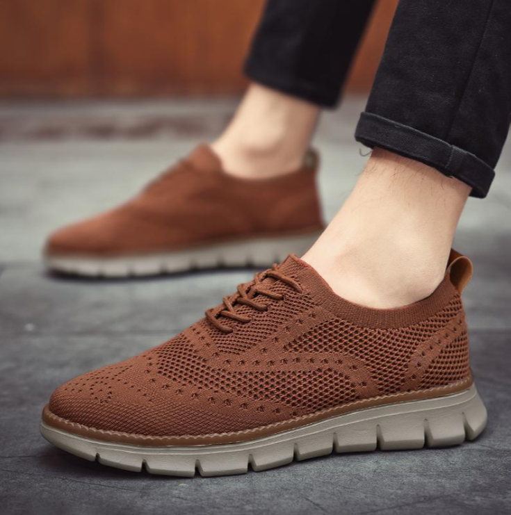 Comfortable men's Heritage Dress Sneakers, perfect for a smart-casual look.