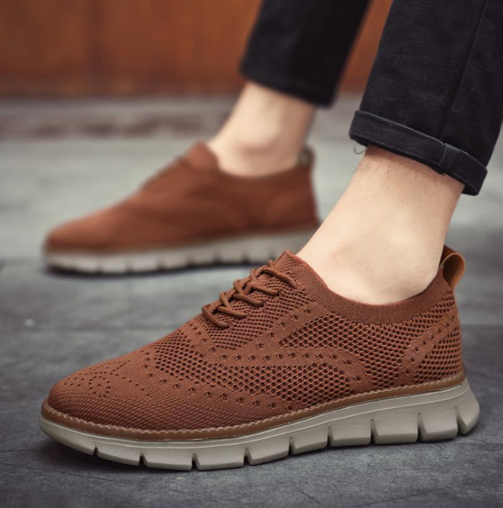 Comfortable men's Heritage Dress Sneakers, perfect for a smart-casual look.