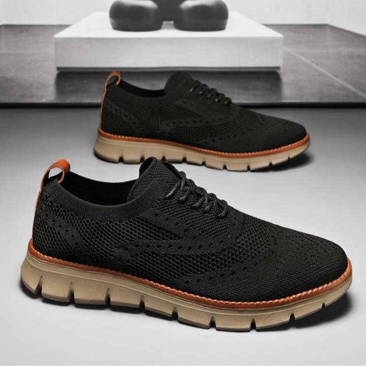 Black men's Heritage Dress Sneakers, versatile for both casual & semi-formal occasions.