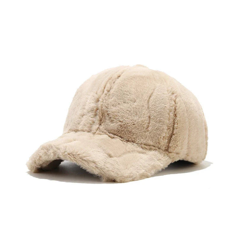 Adjustable women's plush faux fur cap, a warm and cozy winter accessory for any outfit.