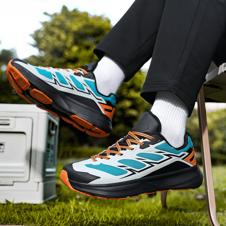 Active men's Trailmark athletic sneakers, designed for daily runs, walks, & training comfort.