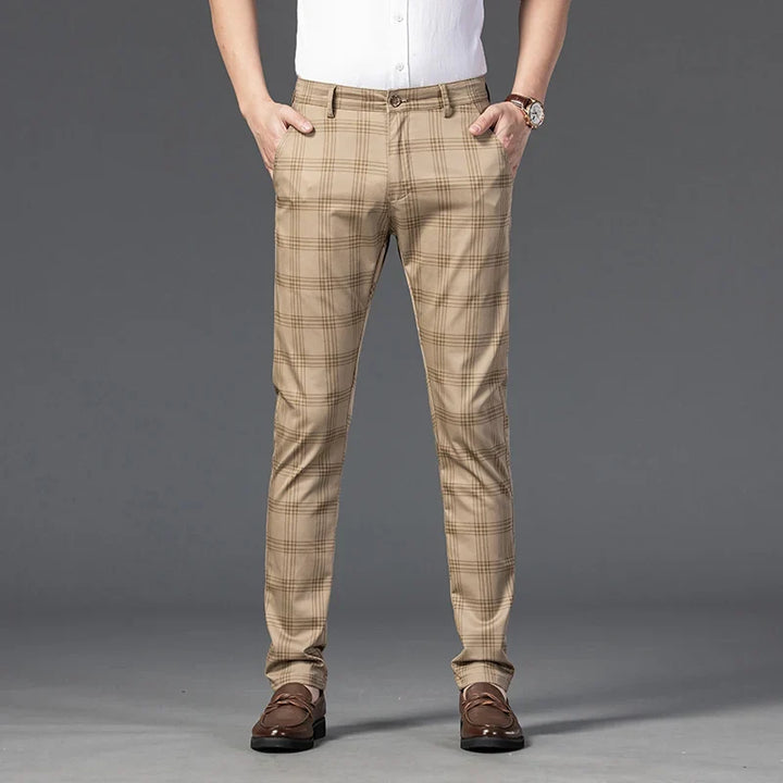 Stylish men's slim fit plaid trousers, perfect for a modern business casual or smart formal look.