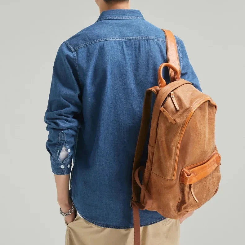 Blue denim men's long-sleeve button-down shirt. Classic casual wear, versatile everyday style.