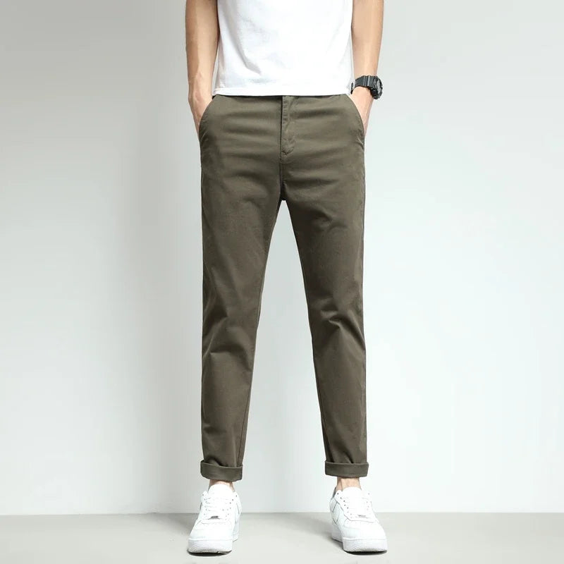 Wrinkle-free, water-resistant black men's performance tech pants. Great for travel, work, and casual wear.