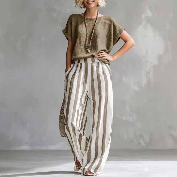 Casual women's linen two-piece set for summer. Relaxed fit top & wide-leg pants. Breathable loungewear comfort.