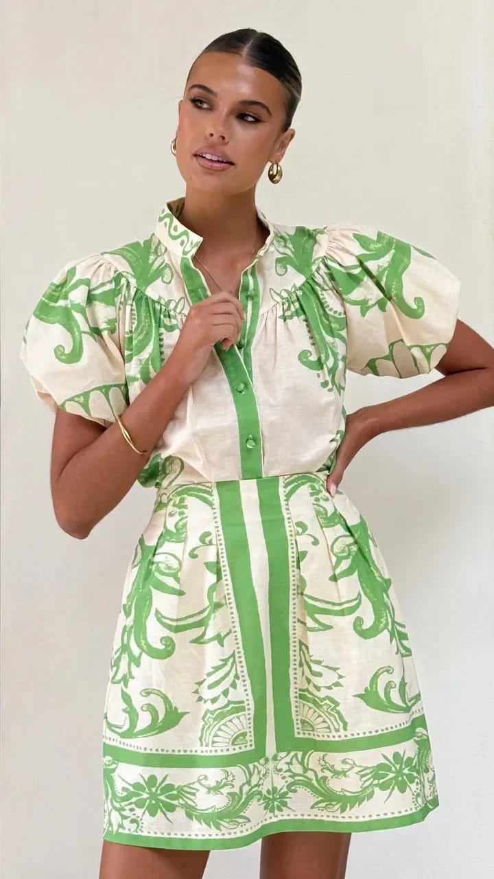 Women's chic floral mini sundress featuring trendy puff sleeves & vibrant colors.