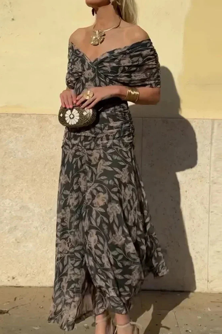 Women's party-ready off-shoulder ruched midi dress, designed with a chic twist-front.
