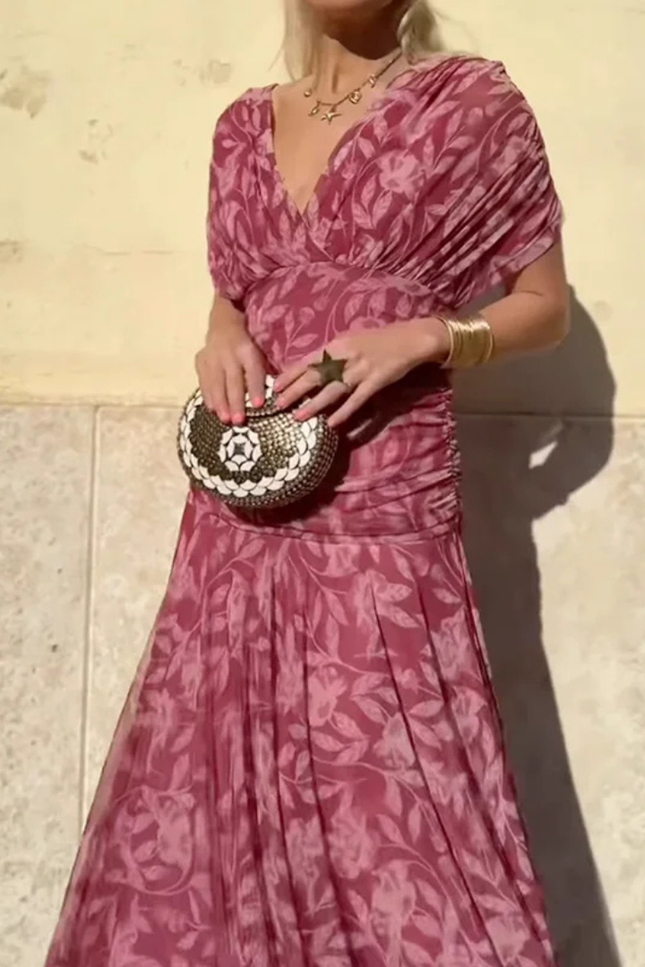 Women's elegant off-shoulder midi dress, featuring a flattering ruched twist-front design.