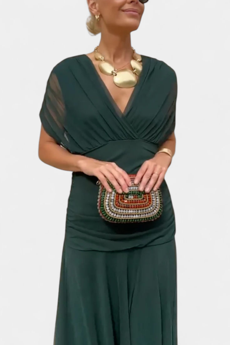 Elegant women's off-shoulder cocktail dress with flattering ruched and twist-front details.
