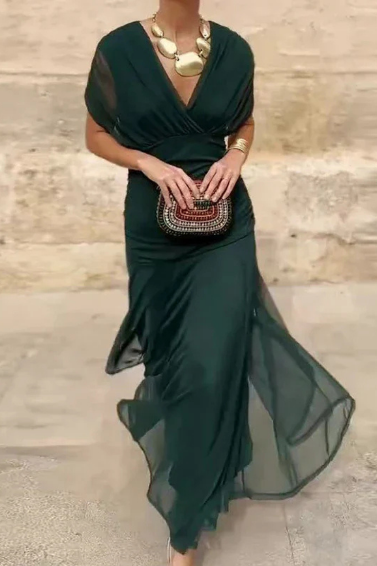 Fashionable women's off-shoulder evening dress with a sophisticated ruched twist-front.